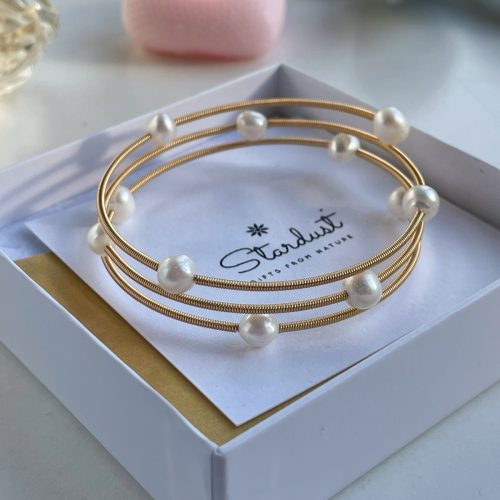Delicate white pearl bangle bracelet