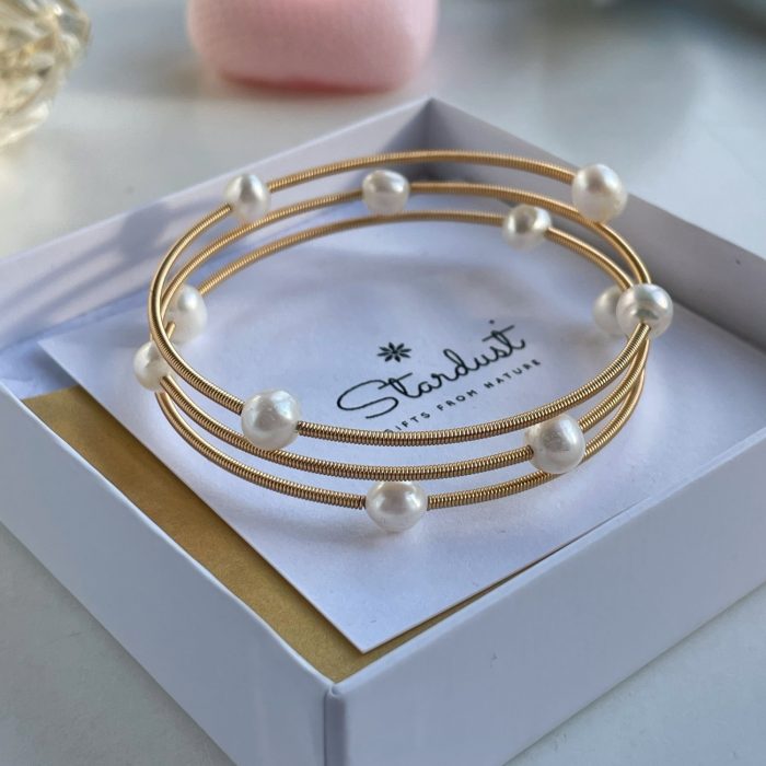 Delicate white pearl bangle bracelet