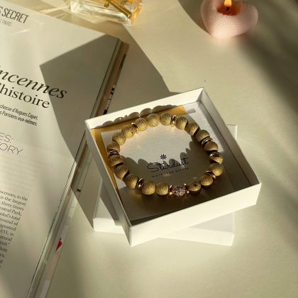Gold beaded bracelet for woman