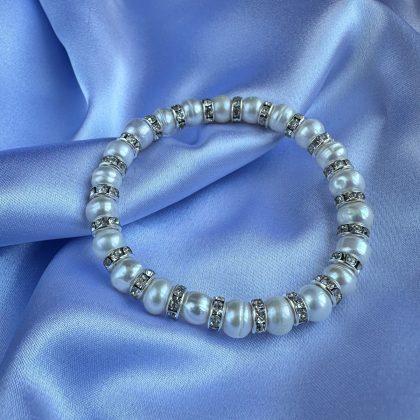 White pearl bracelet with zircons